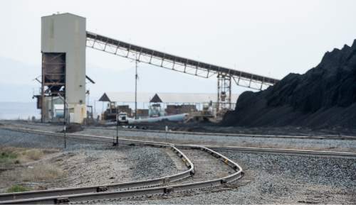 Francisco Kjolseth  |  The Salt Lake Tribune 
Coal trucked from central Utah piles up at the Levan transfer station south of Nephi, where it is loaded on Union Pacific freight cars bound for California. Utah's Community Impact Board has awarded a $53 million loan to four coal-producing counties to invest in a deep-water port in Oakland, Calif. hoping to connect central Utah commodities with export markets. Bowie Resource Partners already exports about 1 to 3 million tons of coal from its Utah mines.